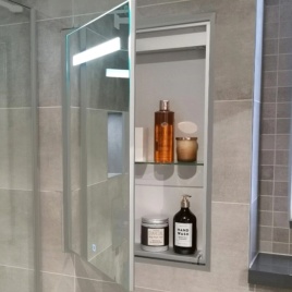 image of an abacus mirrored bathroom cabinet open with bottles showing