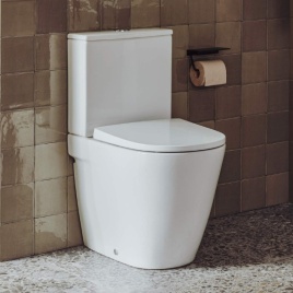 Lifestyle image of Roca The Gap Round Close Coupled Rimless WC installed in a bathroom